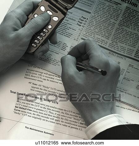 Stock Photography - A man using mobile phone. Fotosearch