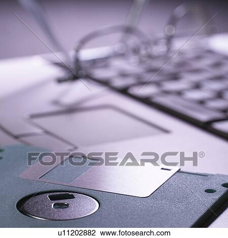 Computer and floppy disk View Large Photo Image Stock Image - Computer and floppy disk. Fotosearch