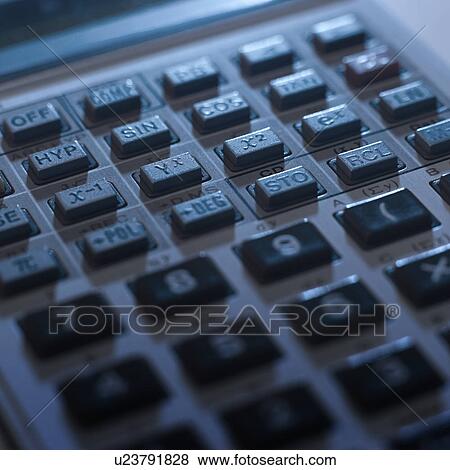 Stock Photo - Push button of calculator, close-up. Fotosearch