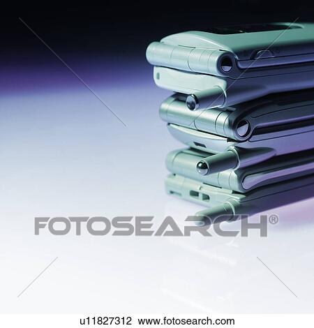 Stock Image - Stacks of mobile phones. Fotosearch