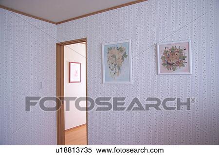 Paintings hanging on wall View Large Photo Image Stock Photography - Paintings hanging on wall. Fotosearch