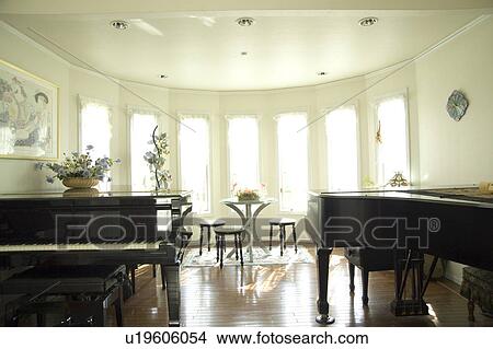 Two grand pianos in living room View Large Photo Image Picture - Two grand pianos in living room. Fotosearch