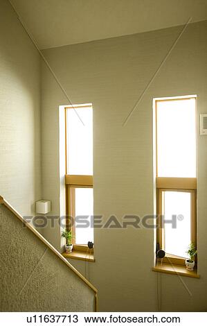 Stock Image - Windows of a house. Fotosearch