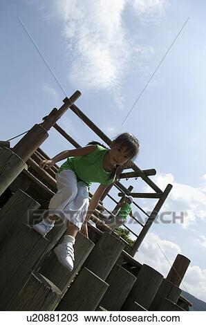 Children playing in playground View Large Photo Image Stock Image - Children playing in playground. Fotosearch