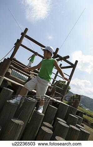 Children playing in playground View Large Photo Image Stock Image - Children playing in playground. Fotosearch