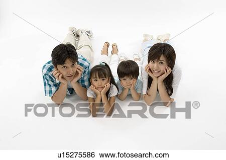 Family lying on front View Large Photo Image Stock Photograph - Family lying on front. Fotosearch