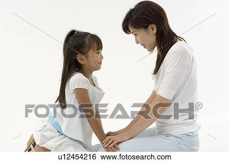 Stock Photograph - Mother and daughter. Fotosearch