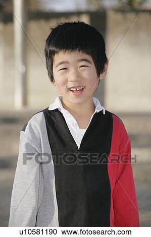 Portrait of a boy standing View Large Photo Image Stock Image - Portrait of a boy standing. Fotosearch