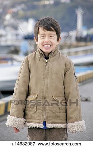 Portrait of a boy standing View Large Photo Image Stock Photo - Portrait of a boy standing. Fotosearch