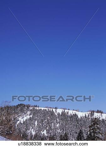 Stock Photo - Snowcapped mountain in Nagano Prefecture, Japan. Fotosearch