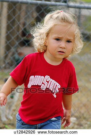 Stock Photograph - Portrait of a girl walking. Fotosearch