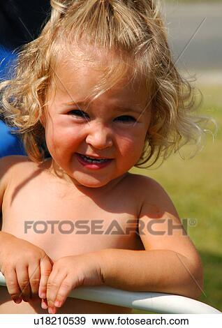 Portrait of a girl smiling View Large Photo Image Stock Photo - Portrait of a girl smiling. Fotosearch