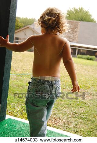 Rear view of a girl walking View Large Photo Image Stock Image - Rear view of a girl walking. Fotosearch