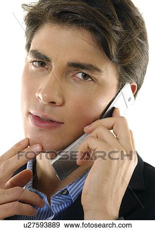 Portrait of a businessman talking on a mobile phone View Large Photo Image Stock Photo - Portrait of a businessman talking on a mobile phone. Fotosearch