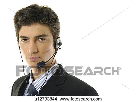 Portrait of a businessman wearing a headset View Large Photo Image Picture - Portrait of a businessman wearing a headset. Fotosearch