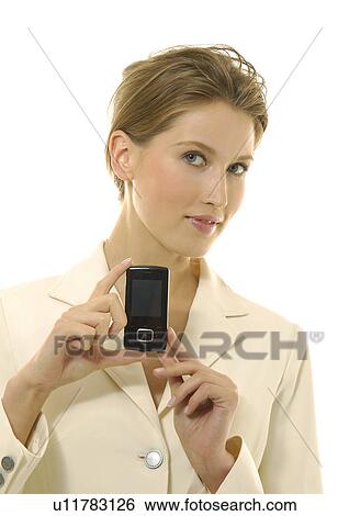 Portrait of a businesswoman showing a mobile phone View Large Photo Image Stock Photograph - Portrait of a businesswoman showing a mobile phone. Fotosearch