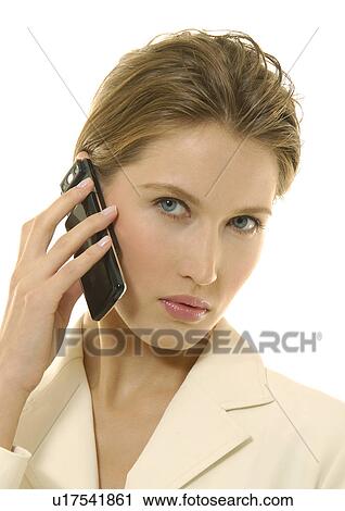 Portrait of a businesswoman talking on a mobile phone View Large Photo Image Stock Image - Portrait of a businesswoman talking on a mobile phone. Fotosearch