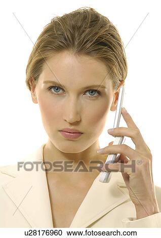 Portrait of a businesswoman talking on a mobile phone View Large Photo Image Stock Image - Portrait of a businesswoman talking on a mobile phone. Fotosearch