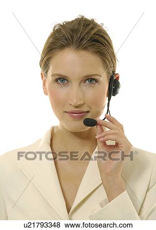 Portrait of a businesswoman wearing a headset View Large Photo Image Stock Photo - Portrait of a businesswoman wearing a headset. Fotosearch