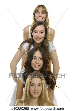 Portrait of four young women in a row View Large Photo Image Stock Photo - Portrait of four young women in a row. Fotosearch