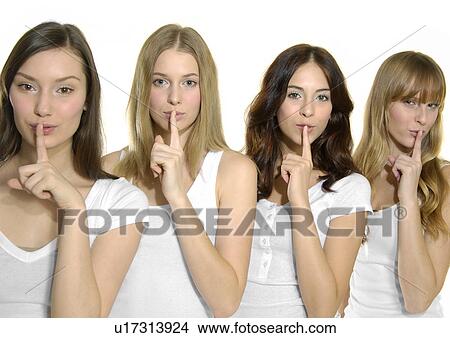 Portrait of four young women with their fingers on their lips View Large Photo Image Picture - Portrait of four young women with their fingers on their lips. Fotosearch