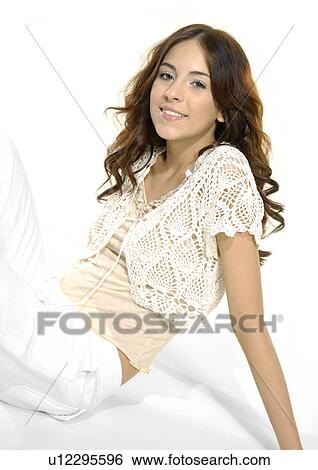 Portrait of a young woman smiling View Large Photo Image Stock Photograph - Portrait of a young woman smiling. Fotosearch