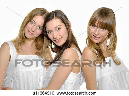 Portrait of three young women smiling View Large Photo Image Stock Photograph - Portrait of three young women smiling. Fotosearch