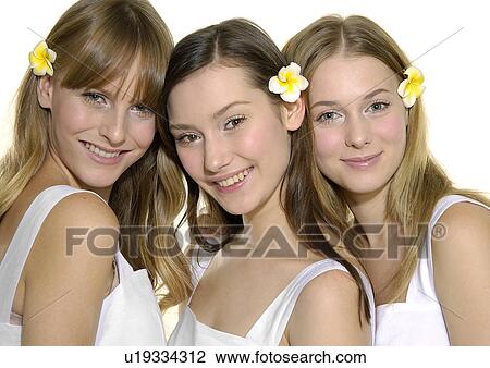 Portrait of two young women smiling View Large Photo Image Stock Image - Portrait of two young women smiling. Fotosearch