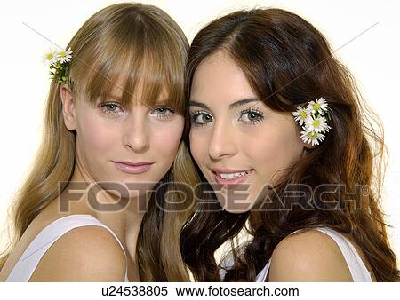 Stock Photography - Portrait of two young women smiling. Fotosearch