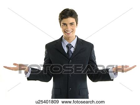 Portrait of a businessman gesturing and smiling View Large Photo Image Stock Photo - Portrait of a businessman gesturing and smiling. Fotosearch