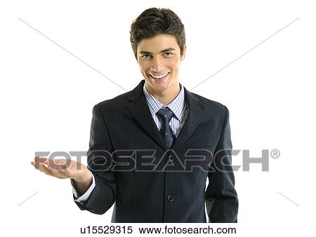 Stock Photography - Portrait of a businessman gesturing and smiling. Fotosearch