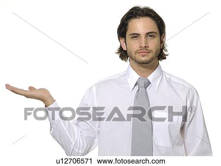 Stock Image - Portrait of a businessman gesturing. Fotosearch
