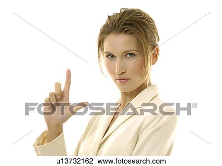 Portrait of a businesswoman making a gun sign View Large Photo Image Stock Image - Portrait of a businesswoman making a gun sign. Fotosearch