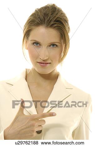 Portrait of a businesswoman making a gun sign View Large Photo Image Stock Photo - Portrait of a businesswoman making a gun sign. Fotosearch