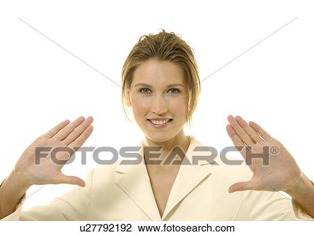 Portrait of a businesswoman showing her palms and smiling View Large Photo Image Stock Image - Portrait of a businesswoman showing her palms and smiling. Fotosearch
