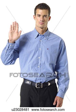 Portrait of a young man gesturing View Large Photo Image Stock Image - Portrait of a young man gesturing. Fotosearch