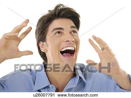 Close-up of a young man laughing View Large Photo Image Stock Image - Close-up of a young man laughing. Fotosearch