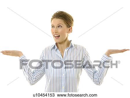 Close-up of a young woman gesturing View Large Photo Image Stock Image - Close-up of a young woman gesturing. Fotosearch