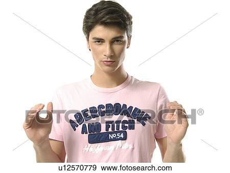 Portrait of a young man gesturing View Large Photo Image Stock Photo - Portrait of a young man gesturing. Fotosearch