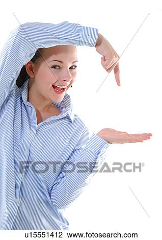 Portrait of a young woman gesturing View Large Photo Image Stock Image - Portrait of a young woman gesturing. Fotosearch