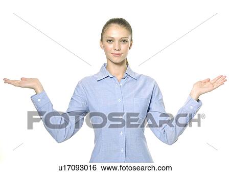 Portrait of a young woman gesturing View Large Photo Image Stock Photograph - Portrait of a young woman gesturing. Fotosearch