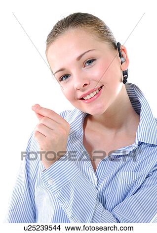 Portrait of a young woman listening to music and smiling View Large Photo Image Picture - Portrait of a young woman listening to music and smiling. Fotosearch