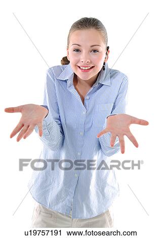 Portrait of a young woman listening to music and gesturing View Large Photo Image Stock Image - Portrait of a young woman listening to music and gesturing. Fotosearch