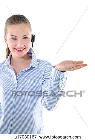 Stock Photo - Portrait of a young woman listening to music and gesturing. Fotosearch