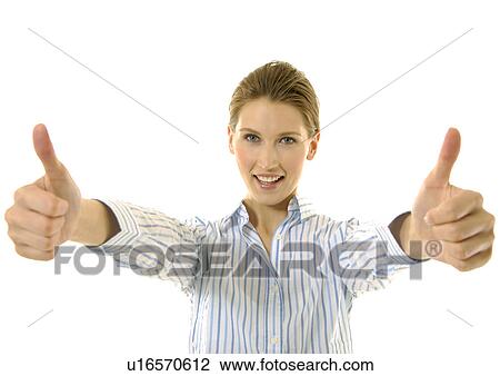 Portrait of a young woman making a thumbs up sign View Large Photo Image Stock Image - Portrait of a young woman making a thumbs up sign. Fotosearch