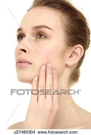 Close-up of a young woman View Large Photo Image Picture - Close-up of a young woman. Fotosearch