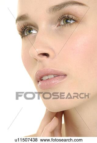 Stock Photo - Close-up of a young woman. Fotosearch