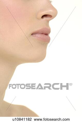 Close-up of a young woman with her lips View Large Photo Image Stock Image - Close-up of a young woman with her lips. Fotosearch