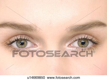 Close-up of a young woman's eye View Large Photo Image Stock Image - Close-up of a young woman's eye. Fotosearch