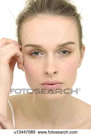 Portrait of a young woman View Large Photo Image Stock Photo - Portrait of a young woman. Fotosearch